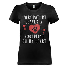 Load image into Gallery viewer, Every Patient Leaves a Footprint on my Heart - T Shirt - EVERY_PATIENT_LEAVES_A_FOOTPRINT_ON_MY_HEART_-_Ladies_-_black