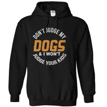Load image into Gallery viewer, Don't Judge My Dogs and I Won't Judge Your Kids - T Shirt - black_28de019c-b437-4227-9e00-38efae739662